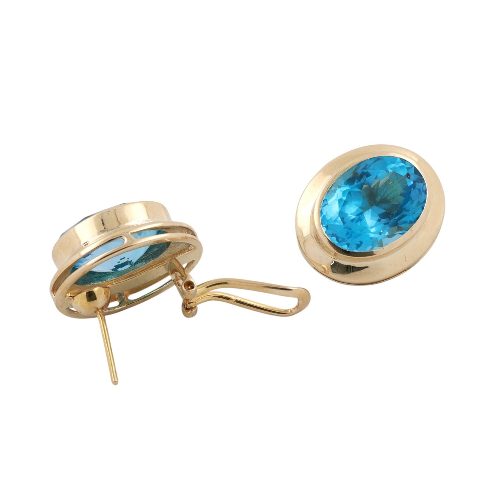 Yellow Gold 22ctw Oval Blue Topaz Bezel Set Lever Back Earrings