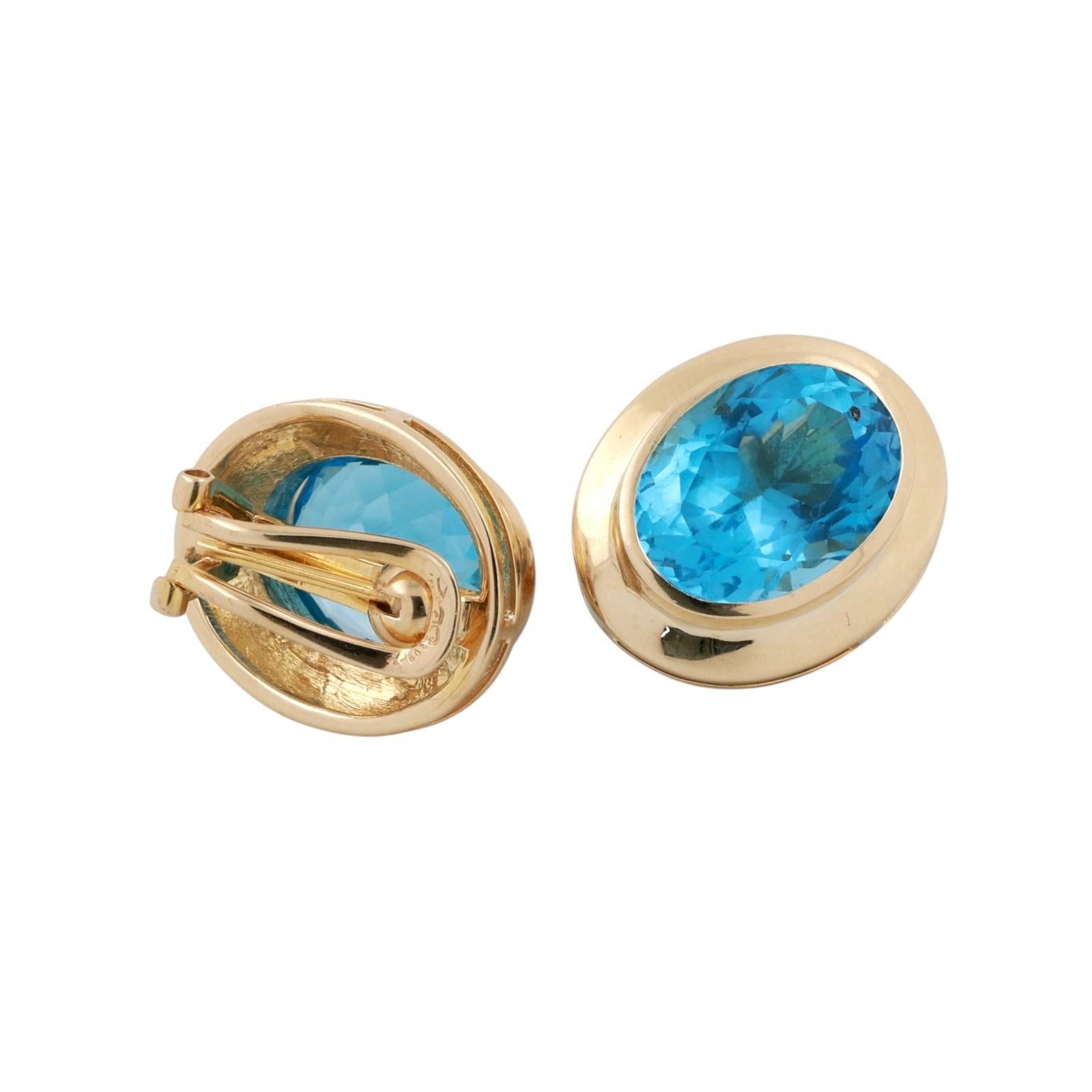 Yellow Gold 22ctw Oval Blue Topaz Bezel Set Lever Back Earrings