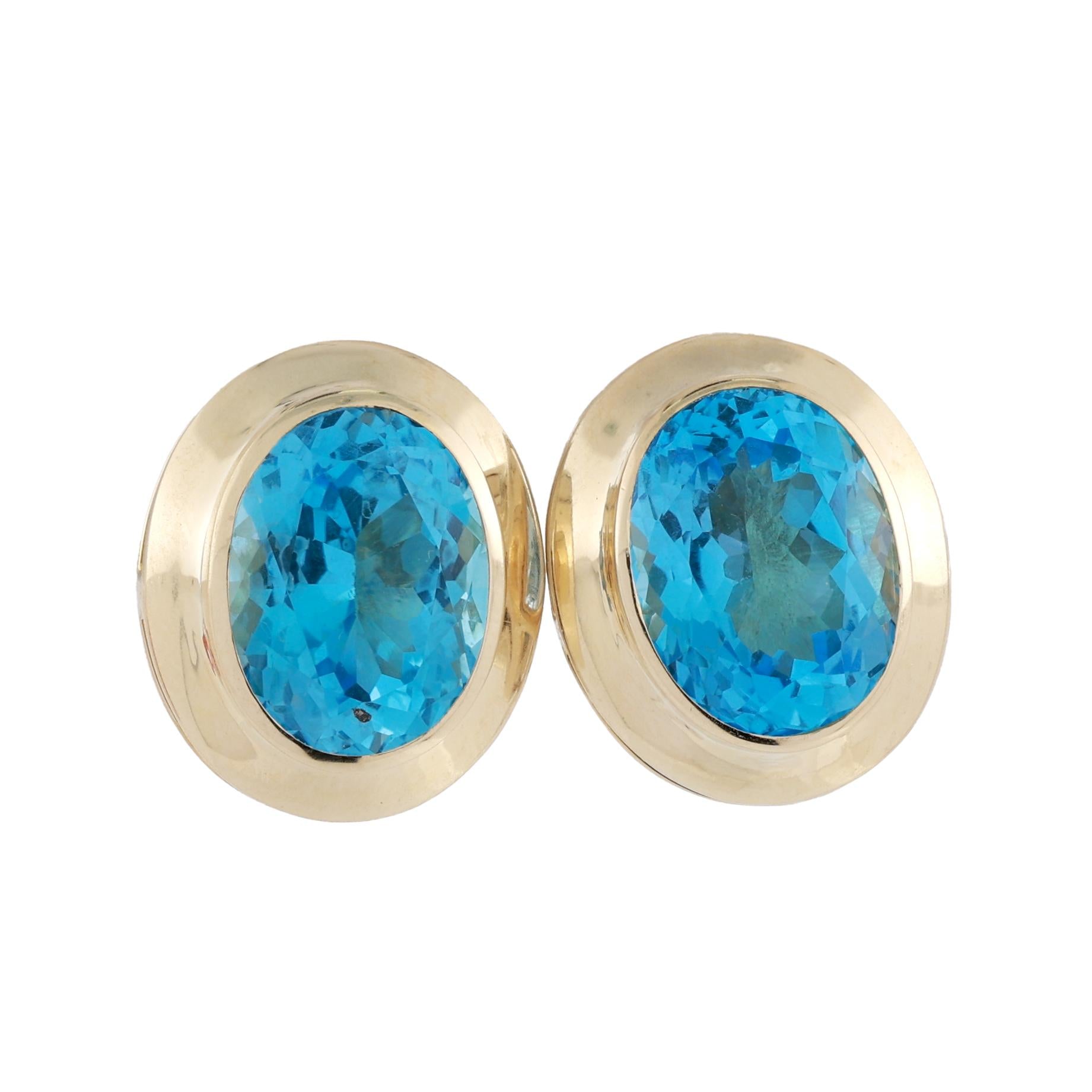 Yellow Gold 22ctw Oval Blue Topaz Bezel Set Lever Back Earrings
