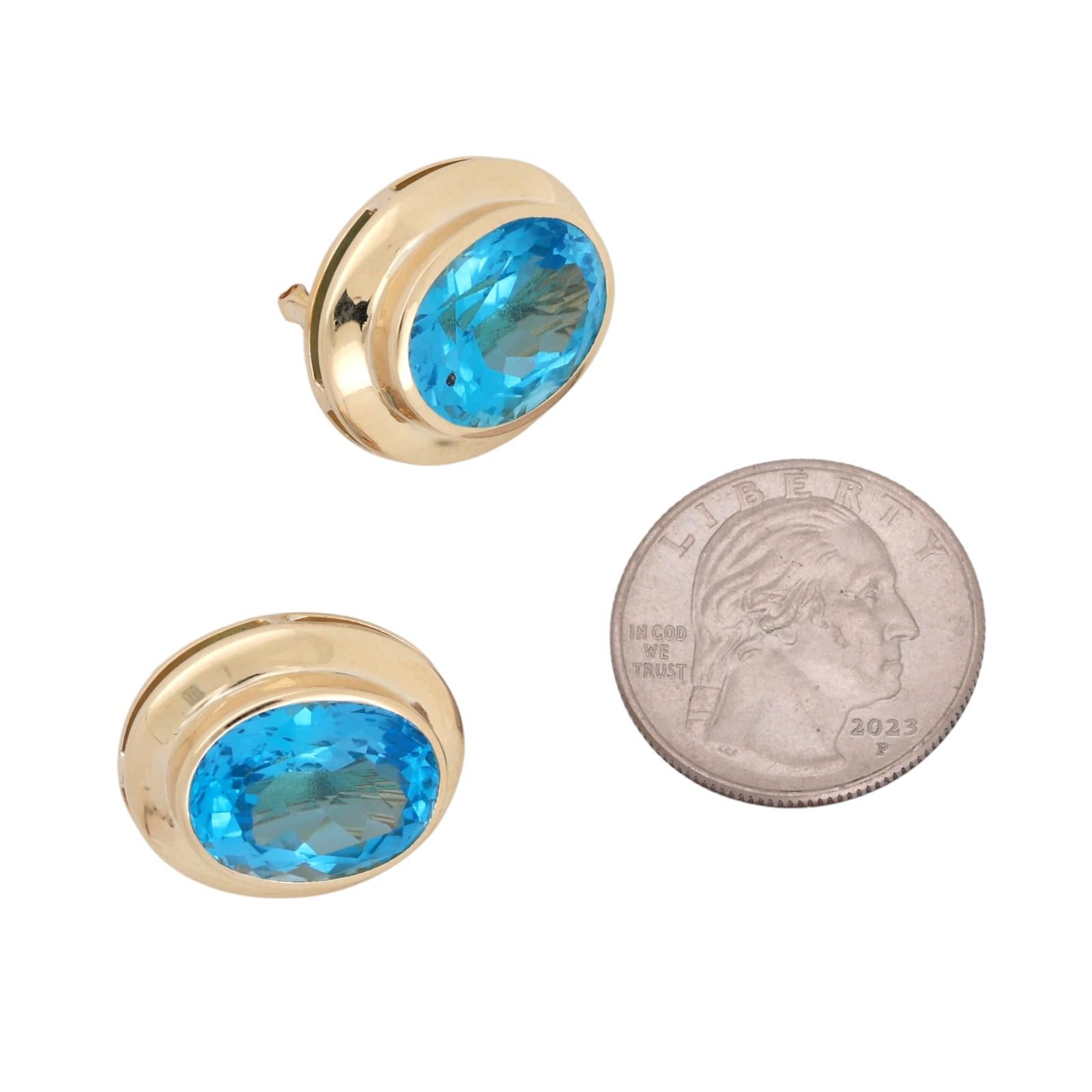 Yellow Gold 22ctw Oval Blue Topaz Bezel Set Lever Back Earrings